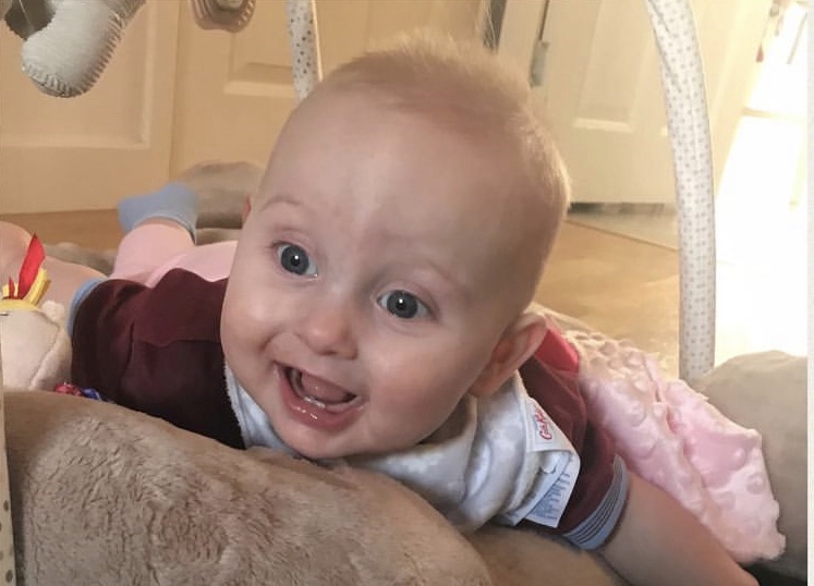 A photo of my baby doing tummy time